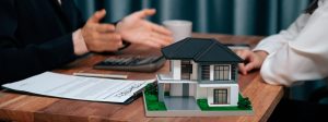 An expat signing mortgage contract
