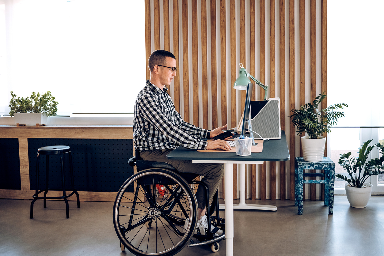 A disabled man enjoying his NDIS house