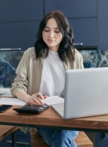 A lady working from home applying for alt doc home loans
