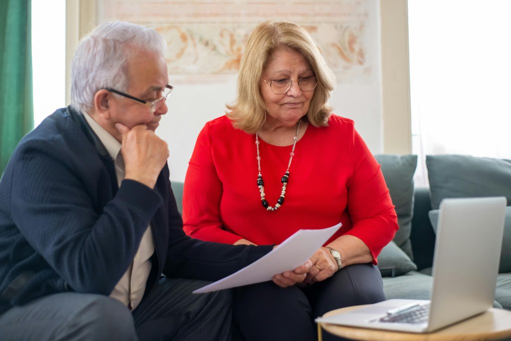 A couple getting some advice in investing in smsf property